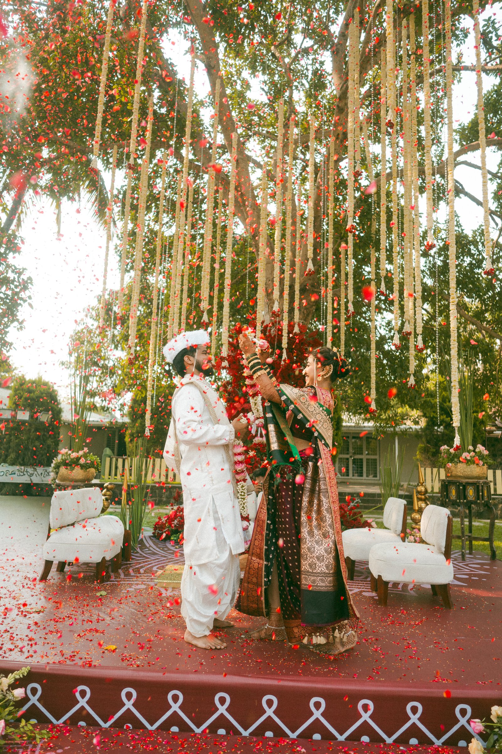 Couple sharing a look with the Taj Mahal behind them